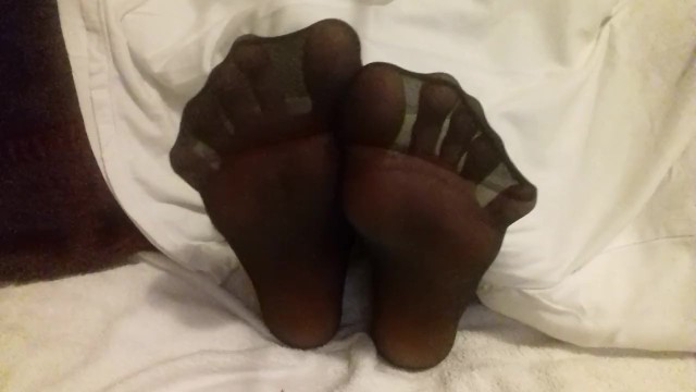 Soles and Feet in Pantyhose - Toes Spread Wide for Your Pleasure