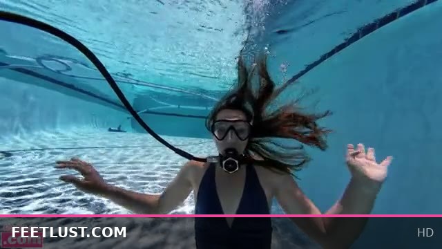 Backwardsw Plays with Scuba Tank Showing Off Sexy Soles and Feet Fun